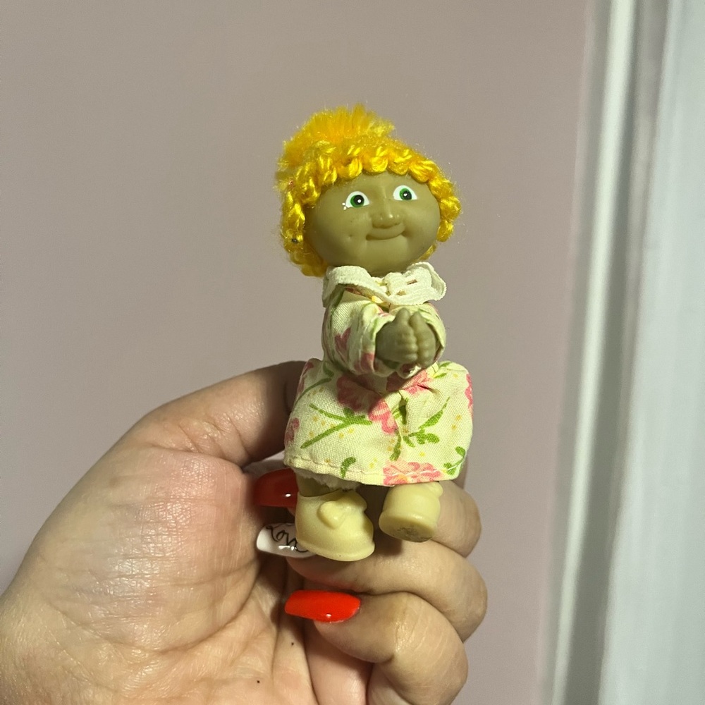 Adorable Yellow-Haired Doll in Floral Dress